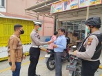 Polsek Minas Bagikan 100 Masker kepada Warga untuk Antisipasi Dampak Kabut Asap Yang Kian Pekat