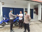 Polsek Minas Bagikan Masker Kepada Masyarakat Yang Beraktivitas Diluar Guna Antisipasi Dampak Kabut Asap