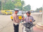 Antisipasi Dampak Kabut Asap, Polsek Minas Bagikan 100 Masker kepada Masyarakat