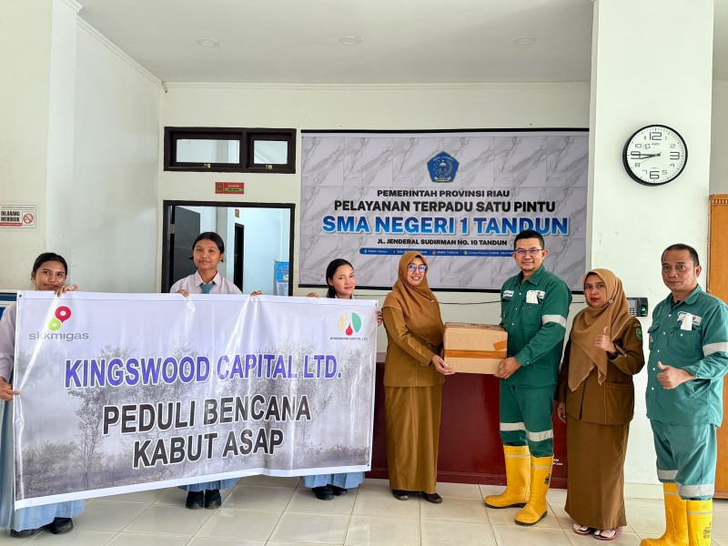 Bagikan 2.000 Masker Kepada Pelajar dan Masyarakat, Bentuk Kepedulian Kingswood Capital Ltd Ditengah Kabut Asap