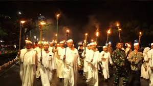 Meski diguyur hujan deras, Pawai Obor dalam rangka Takbiran menyambut Hari Raya Idul Fitri 1446 H